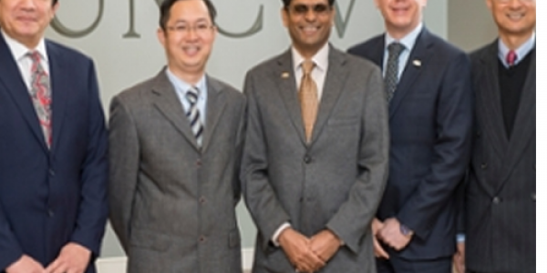 Pictured from left to right: Xin Lu, UNCW Department of Mathematics and Statistics faculty; Wenli He, vice director, Chinese-Foreign Program Management Committee, Chongqing University of Arts and Sciences; Aswani Volety, College of Arts and Sciences dean; Michael Wilhelm, Office of International Programs associate vice chancellor; and Zhuan (John) Ye, UNCW Department of Mathematics and Statistics chair.